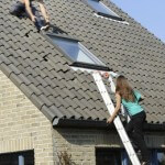 Roofers on roof
