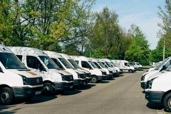 Fleet of White Company Vans Fleet of Insured Company Vans